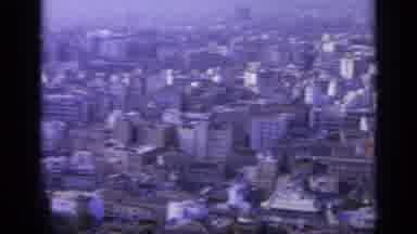 Greece (1963): Dense Major City White Buildings On Hillside Pan To Greener Parks