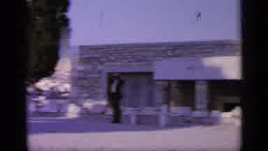 Greece (1963): White Holiday City With People Resting Near Ancient Buildings