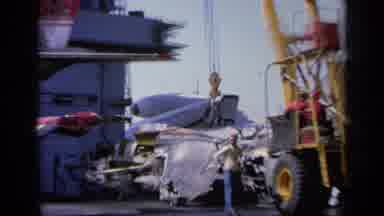 GREECE-1963: Wrecked Plane Being Salvaged On Ship Deck