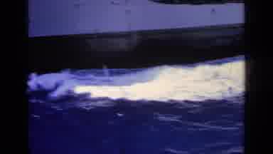 Greece (1963): A Boat Floating In Water With A Closeup Visual Of Numbers On The