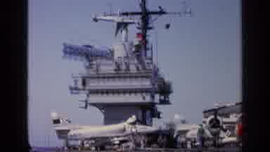 GREECE-1963: Aircraft Carrier With Airplanes On Deck And A Crane On Sunny Day