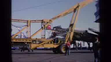 Greece (1963): A Yellow Crane Pulling A Plane Across A Road