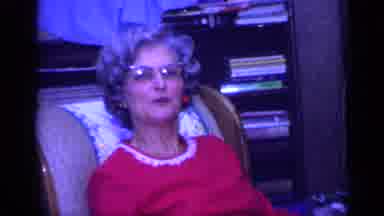 California USA (1968): Three Generations Of A Family Sitting Together Addressing