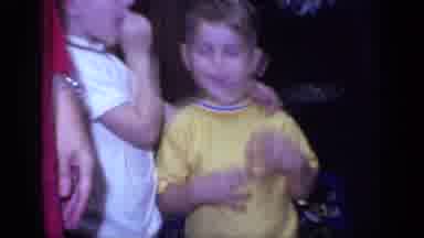 California USA (1968): Two Cute Young Boys Standing Next To Each Other In Front Of
