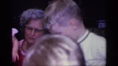 California USA (1968): Grandma Spending Time With Her Grandsons 3 Kids Playing