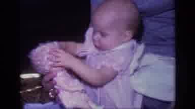 California USA (1968): Vintage Baby Doll With Adorable Baby Playing In A Past
