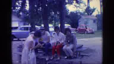 Florida USA (1968): People Sitting And Talking On A Picnic Table