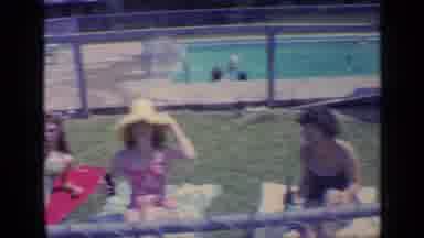 Florida USA (1968): Three Ladies Sunbathing In Swimsuits By A Swimming Pool Sunny