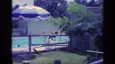 Florida USA (1968): People Playing In Swimming Pool On A Bright Sunny Day