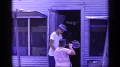 Florida USA (1968): Group Of Friends Playing Badminton For The First Time