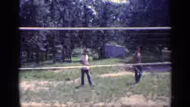 Florida USA (1968): People Playing Badminton With Each Other Smacking The Birdie