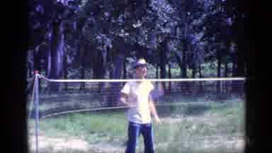 Florida USA (1968): Child Playing Badminton In A Sunny Day
