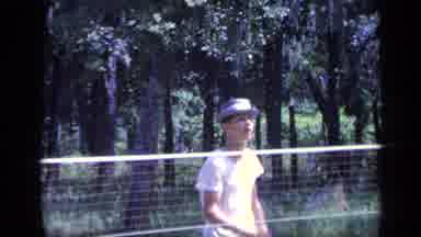 Florida USA (1968): Man Playing Tennis And A Group Of Kids Playing In A Swimming