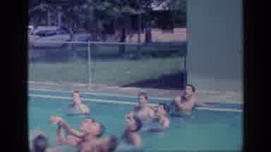 Florida USA (1968): People Playing With Ball In Swimming Pool On A Bright Sunny
