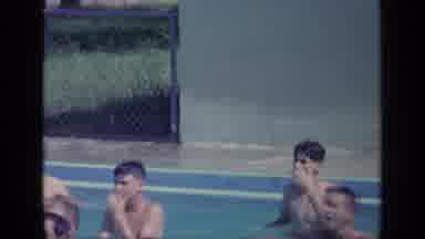 Florida USA (1968): Young Men In A Public Swimming Pool Celebrating Happily
