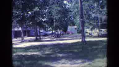 Florida USA (1968): Cars Parked At A Campground Near People Building And Shady
