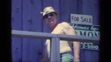 Florida USA (1968): Man Preparing To Clean The Front Of His Home In Which He Is