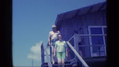 Florida USA (1968): Three People Walking Down Stairs Off Deck One Is Shirtless
