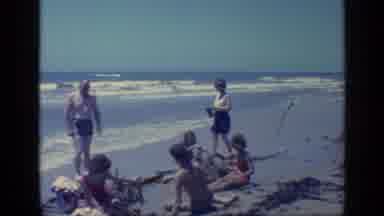 Florida USA (1968): Older Couple Approaches Woman With Children Who Seated On The