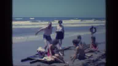 Florida USA (1968): Grandchild Are Playing In The Sand Bank Of The Sea