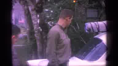 Florida USA (1968): Casual Dressed People Having Conversation Next To Car On The