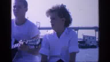 Florida USA (1968): Guitarist Plays Song To A Young Couple By The Bay