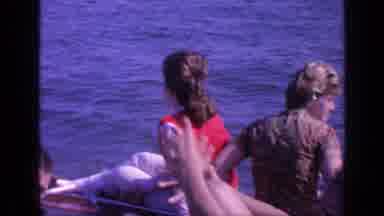 Florida USA (1968): Two Women Sitting On Boat Looking At Water On A Bright Sunny