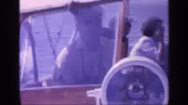Florida USA (1968): A Sailor Is Shown Driving A Boat And Then Waves To The Camera