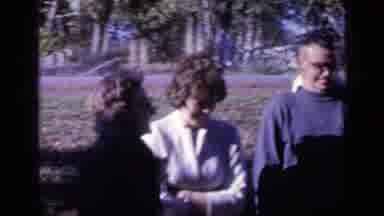 Florida USA (1968): Friends Gathering In The Park Under A Tree In A Sunny Day