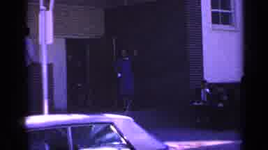 Florida USA (1968): Women Standing At The Doorway To A Building While Waving To