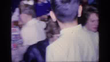 Florida USA (1968): Child Going To Look For Something In A Room Full Of People Who