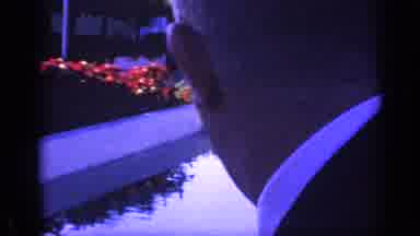 Florida USA (1968): Boy Looks At Water And Then Makes A Funny Face At Man Near