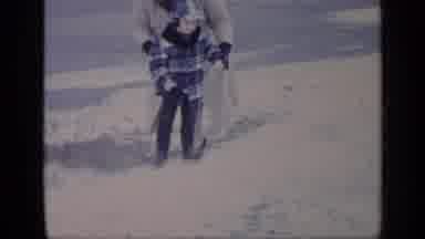 California USA (1969): Mother And Son First Steps In The Snow And Winter