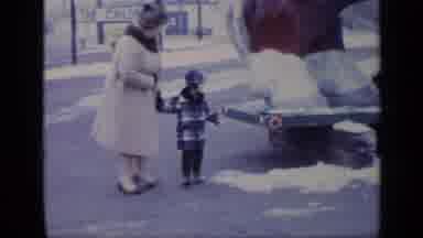 California USA (1969): Grandmother And Little Boy Outside In The Cold Weather
