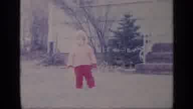 California USA (1969): Little Girl In The Front Yard And Man Patting His Head
