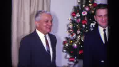 California USA (1969): Two People Talking With Each Other With Small Decorated