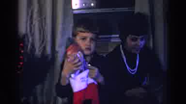 California USA (1969): Child Not Happy With His Christmas Present Inside Of A Boot