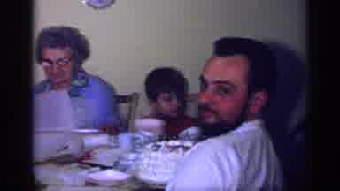 California USA (1969): Family Gathered Around A Table With Cake At A Birthday