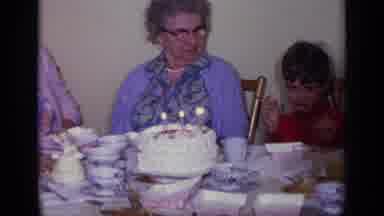 California USA (1969): Child Turns Away As Old Lady Watches Him Then Smaller Child