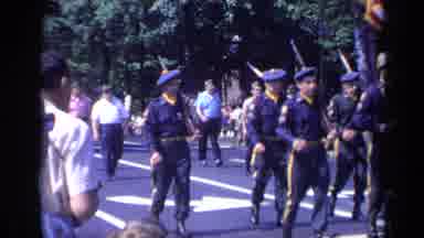 California USA (1969): Military Personnel And Military Veterans March With Rifles