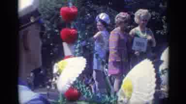 California USA (1969): Lots Of People Of Pretty Floats And Some Are Throwing Candy