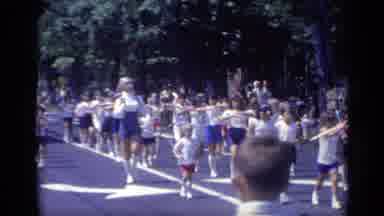 California USA (1969): Adults And Kids Parade Through The Streets In Unison To