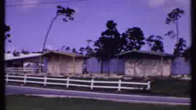 Bahamas (1969): Person Walking Amongst Deserted Houses