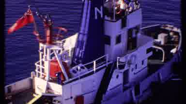 Bahamas (1969): White Boat With N Floats In Calm Ocean Waters With Red Bermuda