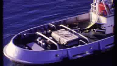 Bahamas (1969): A Boat In The Blue Water Near The Coast Line