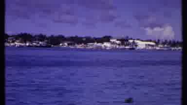 Bahamas (1969): A Coast Full Of Fishing Or Adventure Boats Stationed With Trees On