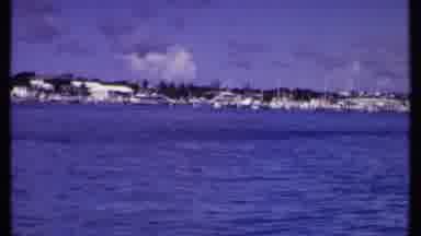 Bahamas (1969): A Village On The Seashore With All The Boats Docked In Foreground