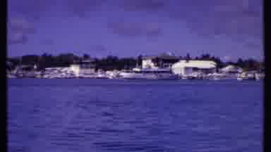 Bahamas (1969): A Boat Dock From The Perspective Of A Passing Boat