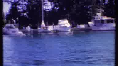 Bahamas (1969): Film From A Passing Boat Of Boats And Yachts Docked In A Marina