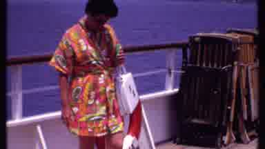 Bahamas (1969): Woman Walking On Cruise Boat Looking At Water